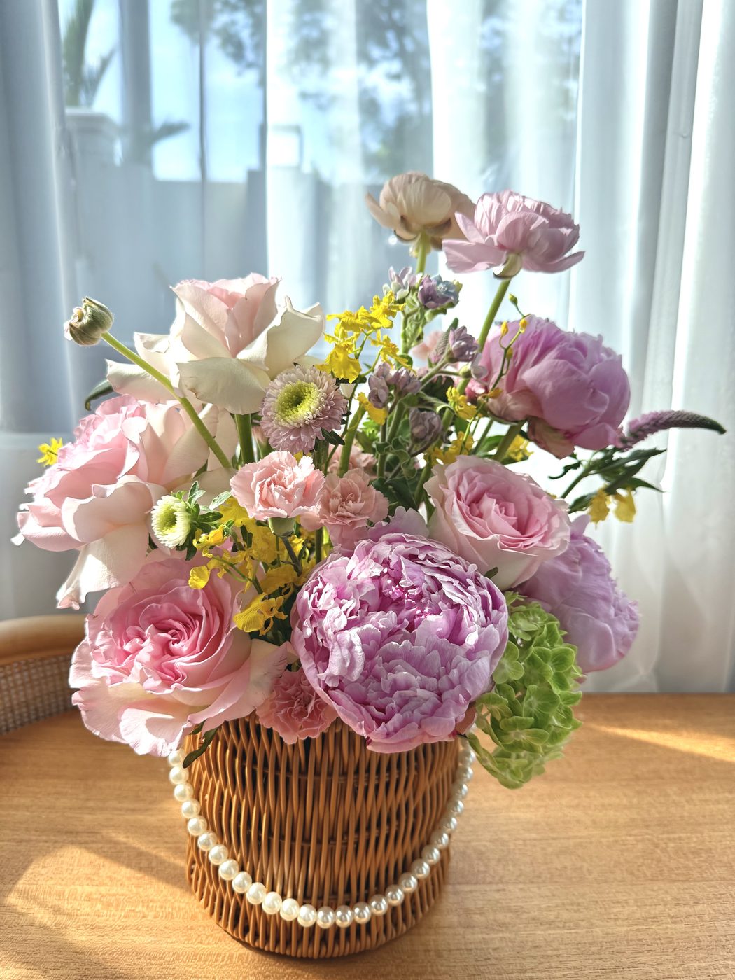 Woven basket bouquet with pearl trim