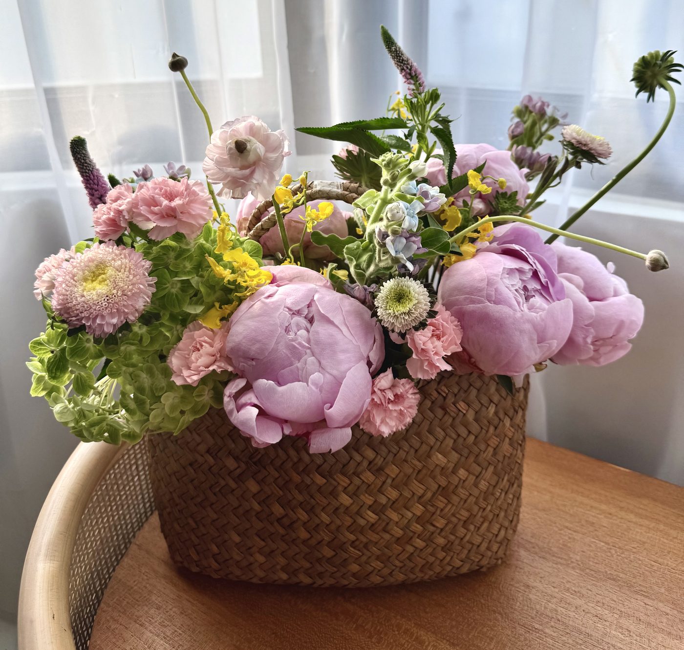 Close-up of peonies and chrysanthemums